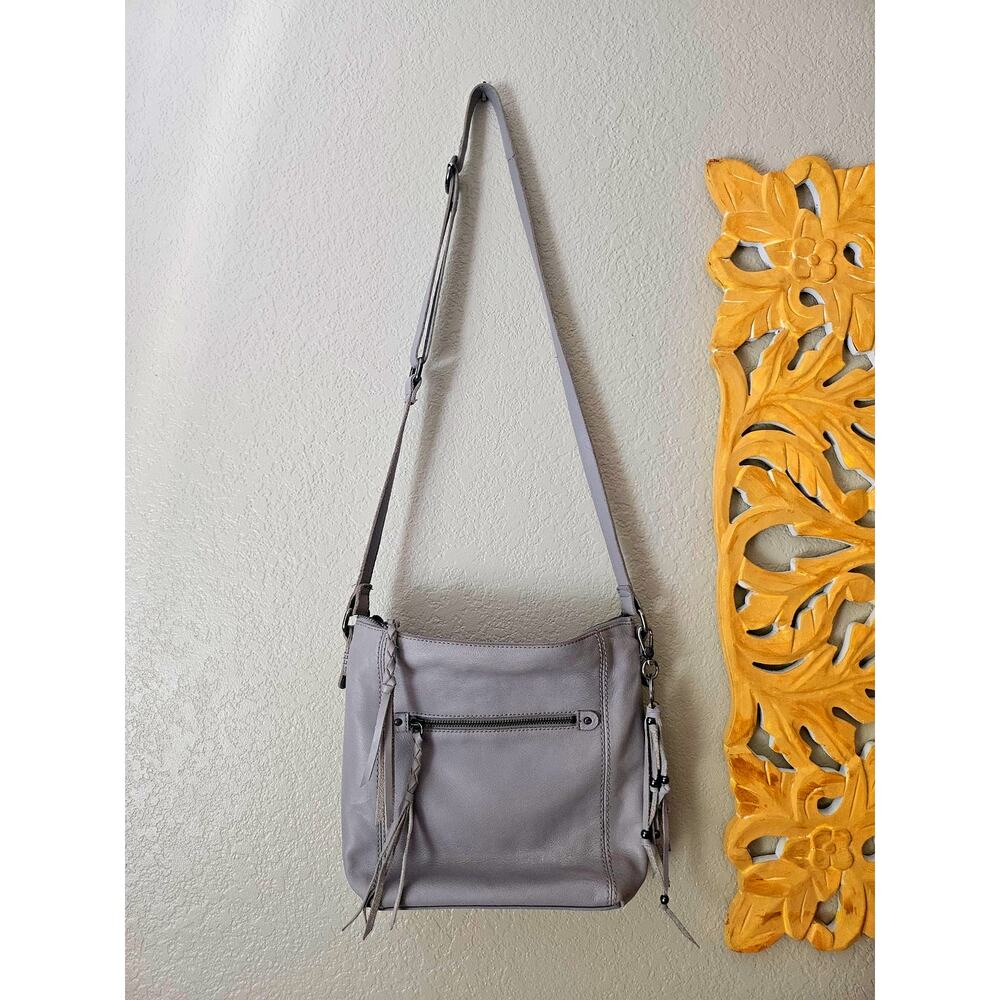 The Sak Stone Gray Leather Crossbody, adjustable, tassel detail